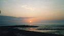 Image of sunset preceeding the Stairways to the moon at Roebuck Bay in Broome WA.