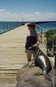 Image of Raymond with seal statue on the pier at Esperance WA.